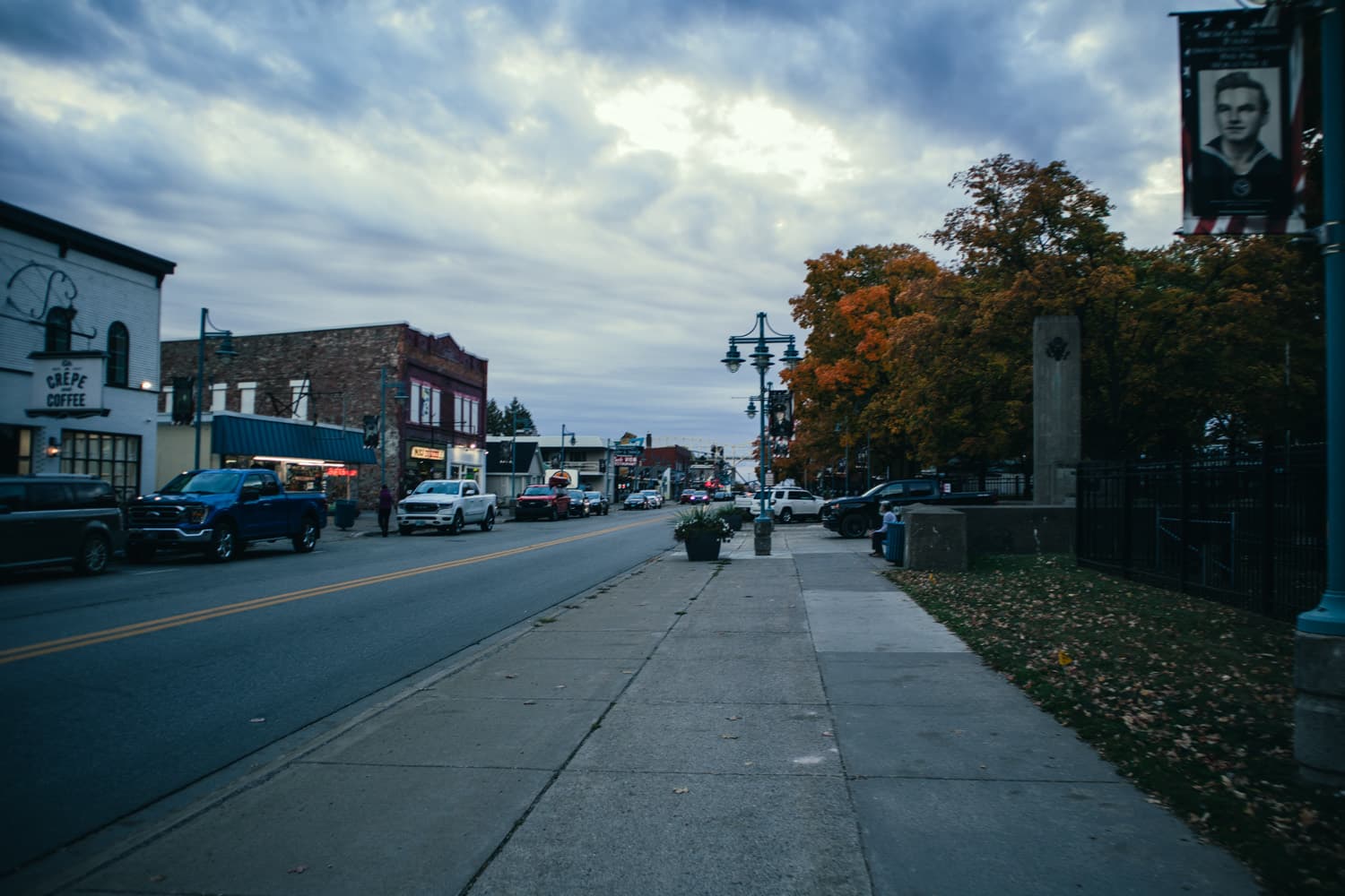Portage Avenue in downtown Sault Ste. Marie with fall trees near the Soo Locks Park entrance